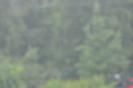 Raindrops on black glass on black glassの写真素材