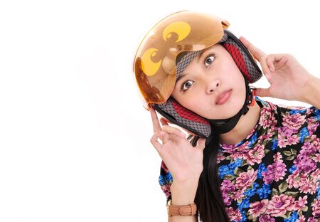 cute girl with a helmet, isolated on white backgroundの写真素材