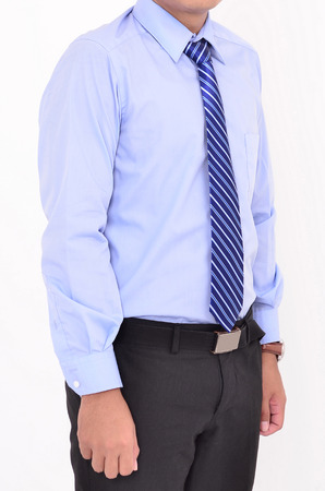 young businessman standing isolated on white backgroundの写真素材