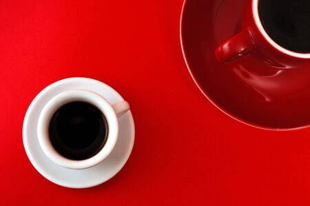 Coffee closeup in red backgroundの写真素材