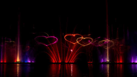 Musical fountain with laser animations. Fountain Roshen. laser show.