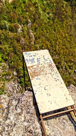 Bridge for rope jumping over abyss in canyonの写真素材