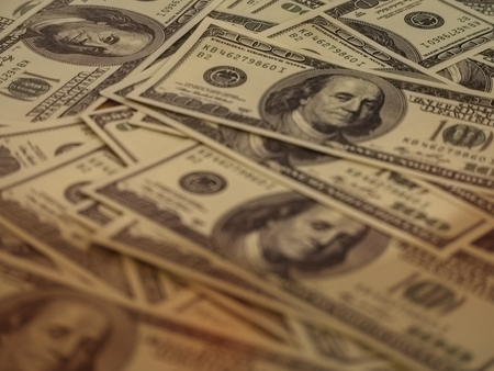 The money plenty on wooden desk