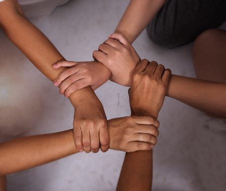 In selective of Ring of hands teamwork stacked together,the collaboration concept,warm light tone,blurry light design background,theの写真素材