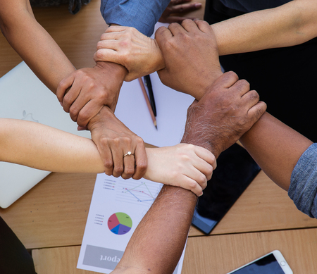 The teamwork hands ,cooperation concept,the business group,united hands together with...
