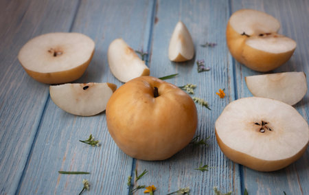 Korean pear put on timber board,blurry light aroundの写真素材