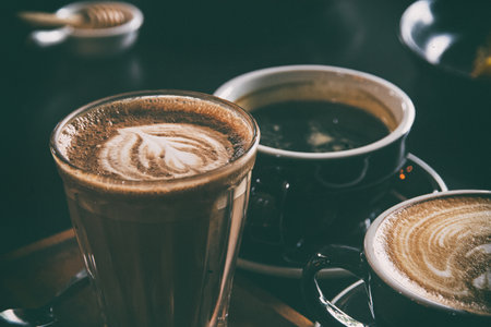 The abstract art design background of three coffee cups,vintage toneの写真素材