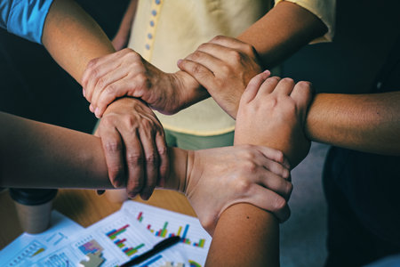 The abstract art design backround of Business group,Hands together joining teamwork...