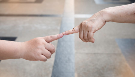 Human fingers touch together,sign and symbol of the love couple,romantic feelingの写真素材