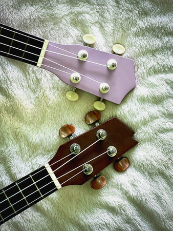 Two pieces of Ukulele headstock with tuning pegs made from wood,use for set up sound,acoustic...