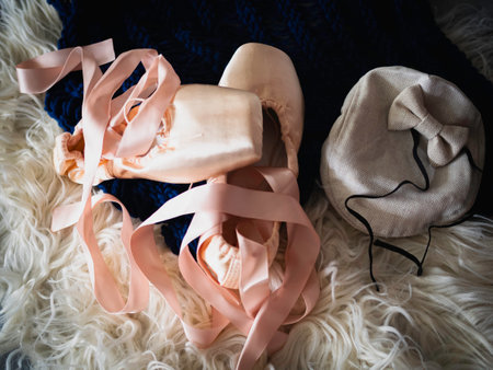 Pair of ballet shoe with satin soft pink ribbon.Put on background.equipment of Ballerina for dance.の写真素材
