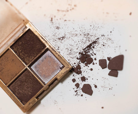 Eye shadow palette put on background,show texture and brown color shade of makeup,beauty fashion