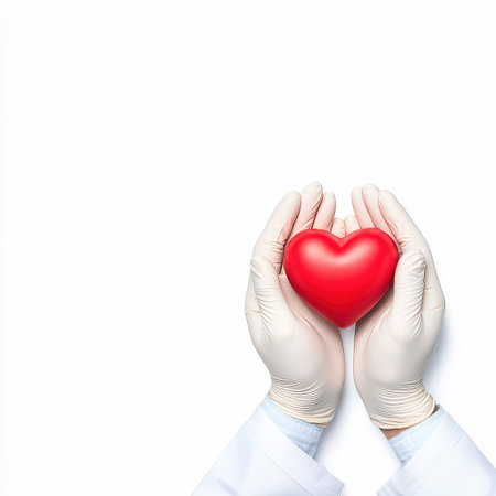 Hands Holding a Bright Red Heart Symbolizing Love and Compassion in Healthcare Settingの素材