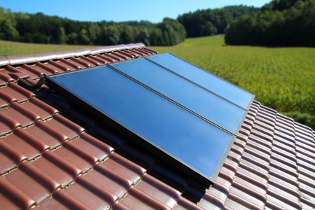 Solar collector on a cottage in the countryの写真素材