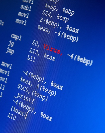 Code in Assembler programming script with a red Word VIRUS の写真素材