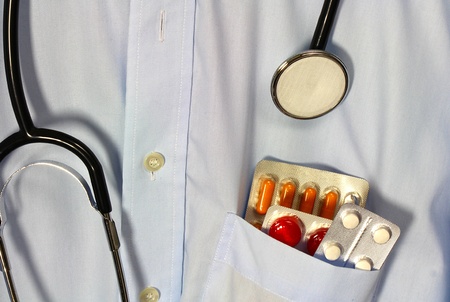 Medicine and stethoscope in a doctorの写真素材