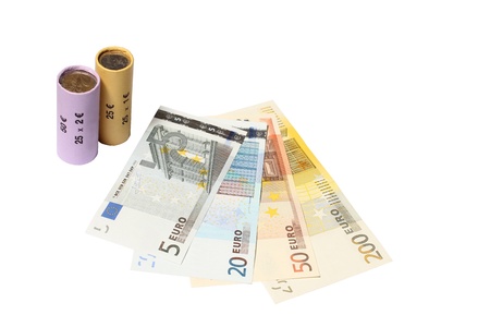 Two Packed coin rolls with bank notesの写真素材