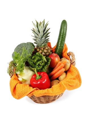 Green an colorful young and fresh Vegetables in a Basketの写真素材