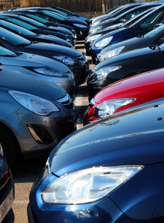 New cars on a parking place of a car or rental houseの写真素材