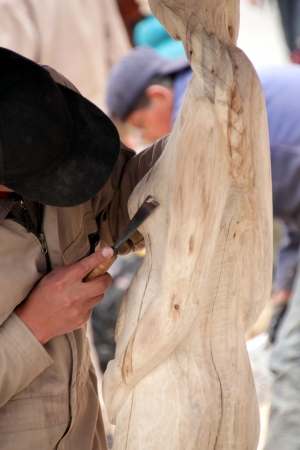 Woodcarfing on a woman s sculptureの写真素材