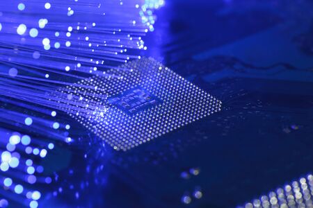 Broadband Fiber Optic Cable on CPU Motherboard Circuit Boardの写真素材