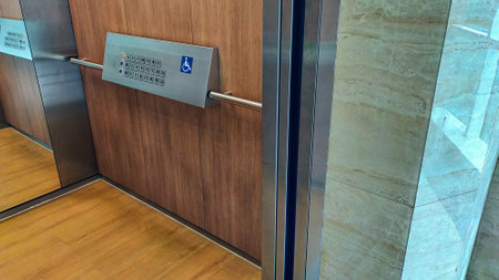 The disabled elevator button or panel with braille code of the elevator.