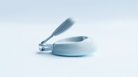 Small gray fancy nail clipper isolated on white for baby or kid.の写真素材