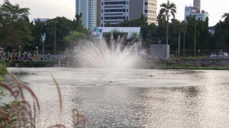 Realistic City fountain or water fountain at the lake using water jet pump spraying spray in the air.の写真素材