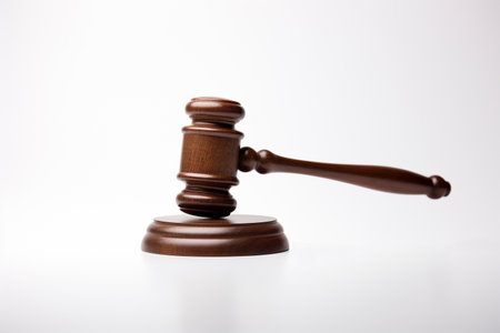 Wooden judge gavel isolated on white background, law and justice conceptの素材