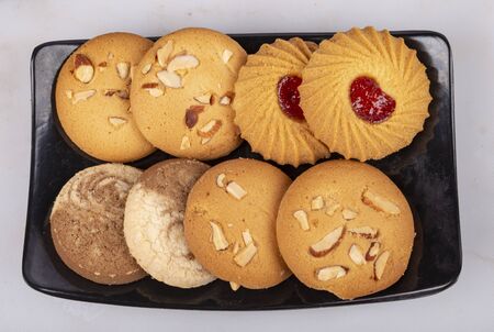 mix bakery cookies set with black tray in land scape position 
