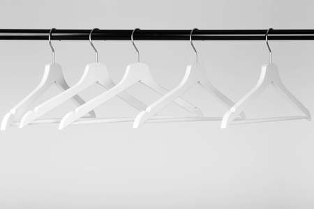 slider black fashion coat rack with empty white hangers