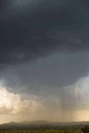 landscape distant rain falling on the mountain