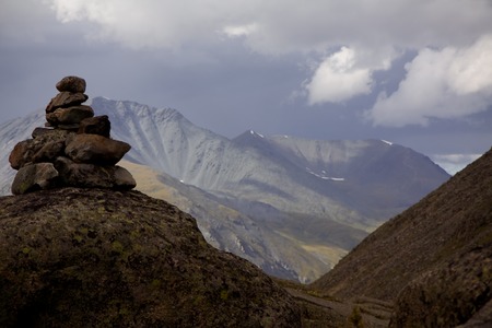 Stones mark a picturesque peak in Altai mountains, Russia