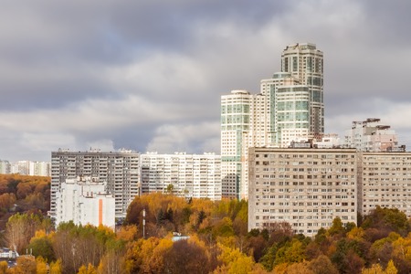 October 2017, Moscow, Russia - aerial view of modern high rise residential buildings surrounded by autumn pakの写真素材