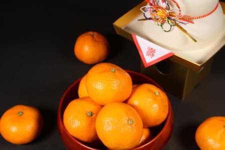 Orange and New year's imageの写真素材