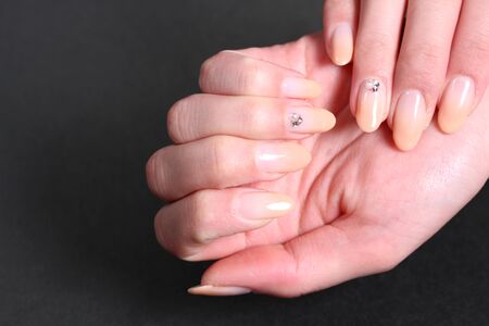 Female hand with design nailsの写真素材
