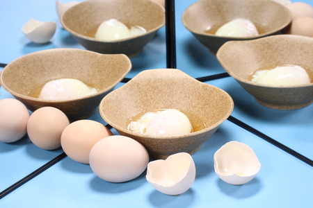 Poached egg reflecting in the mirror.の写真素材