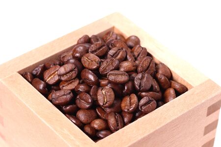 Coffee beans in a Japanese wooden cupの写真素材