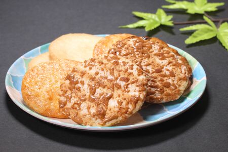 Japanese rice crackers on a plateの写真素材
