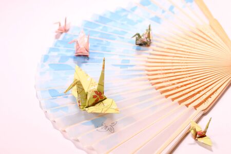 Paper cranes and japanese fanの写真素材