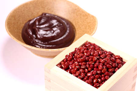 Red beans in a wooden cup and Anko (red bean paste)