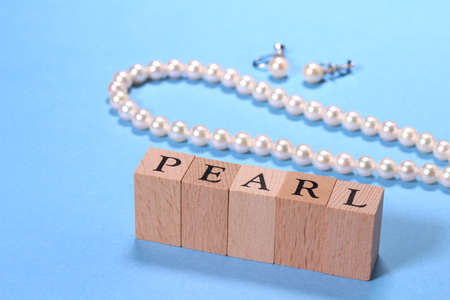 Pearl Necklace and earrings and letters of  PEARLの写真素材
