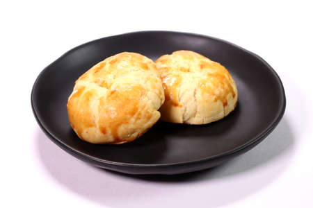 Sweet pumpkin buns on a plate