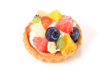Fresh fruit tart on white backgroundの写真素材