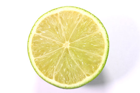 Half of lime on white background