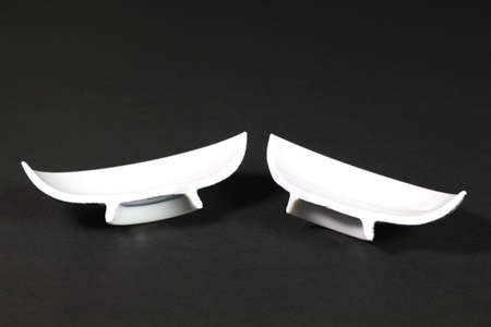 Broken tableware on black backgroundの写真素材