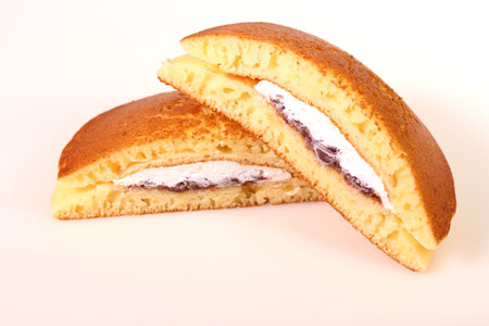 Dorayaki, Japanese pancakes filled with sweet red bean paste and whipped creamの写真素材