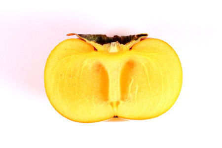 Cross section of seedless persimmon fruitの写真素材