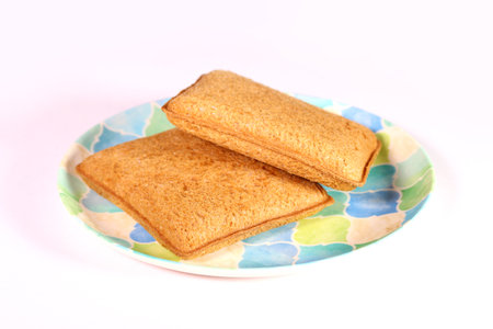 Press sandwich on a plate on white backgroundの写真素材