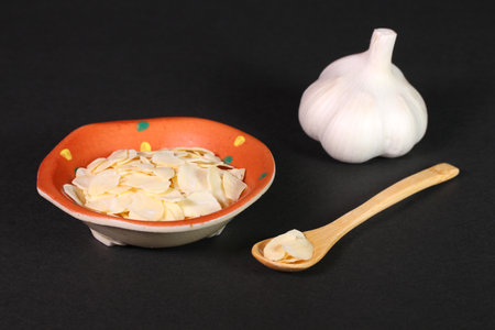 Garlic and sliced garlicの写真素材